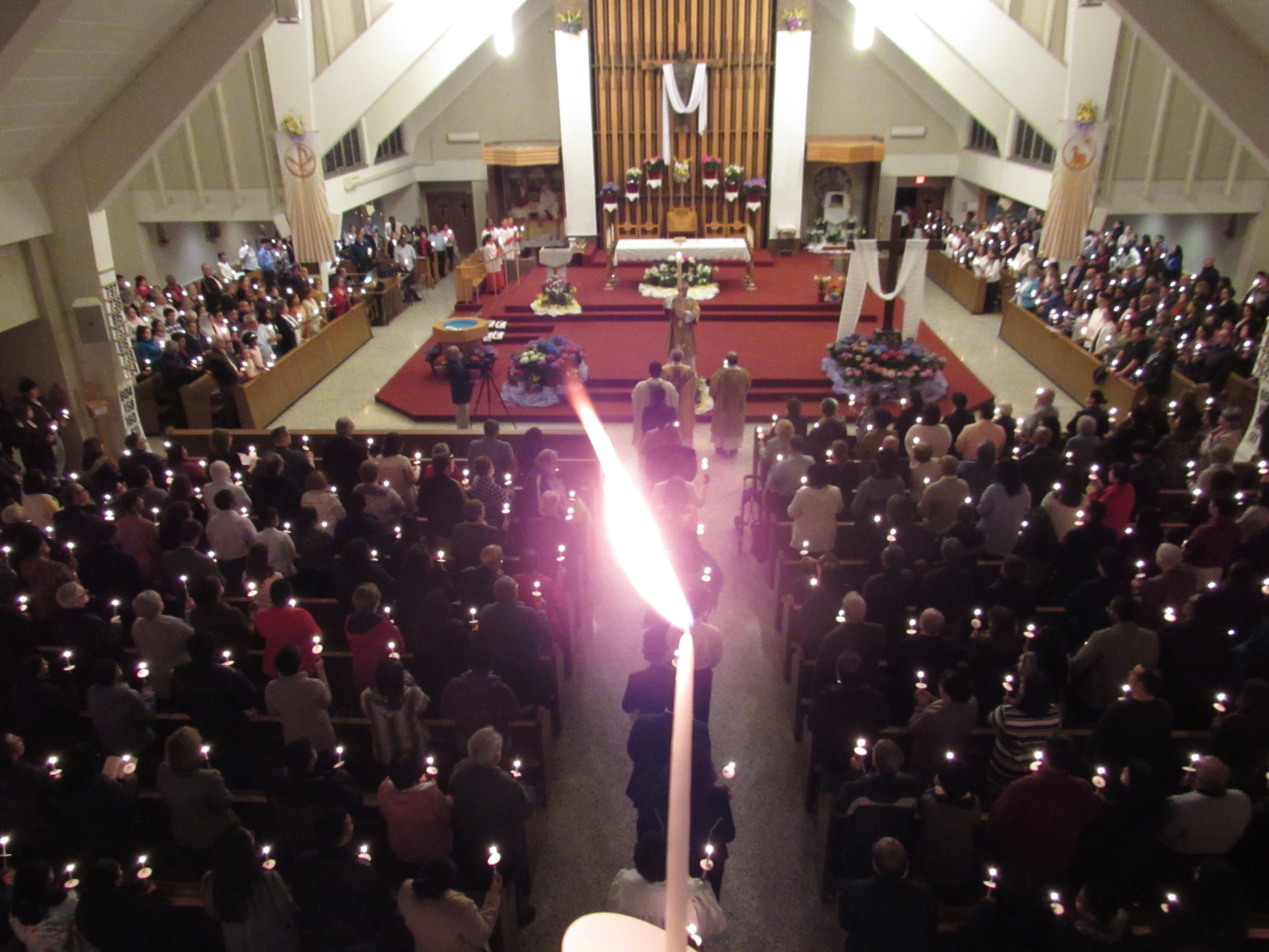 Lit candles inside the church during the Easter vigil.